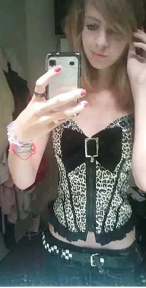 Teen takes a selfie with sexy clothes